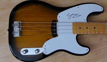 Bid for a signed Signature Fender Precision Bass Guitar...